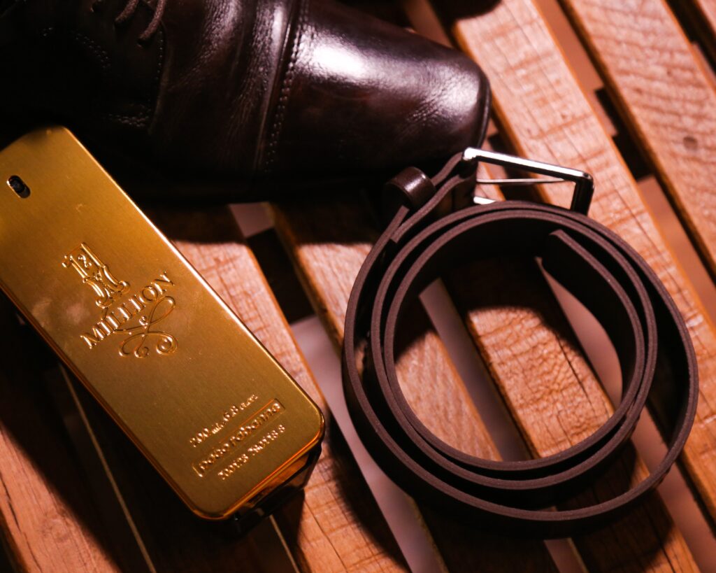 A brown leather belt for men.