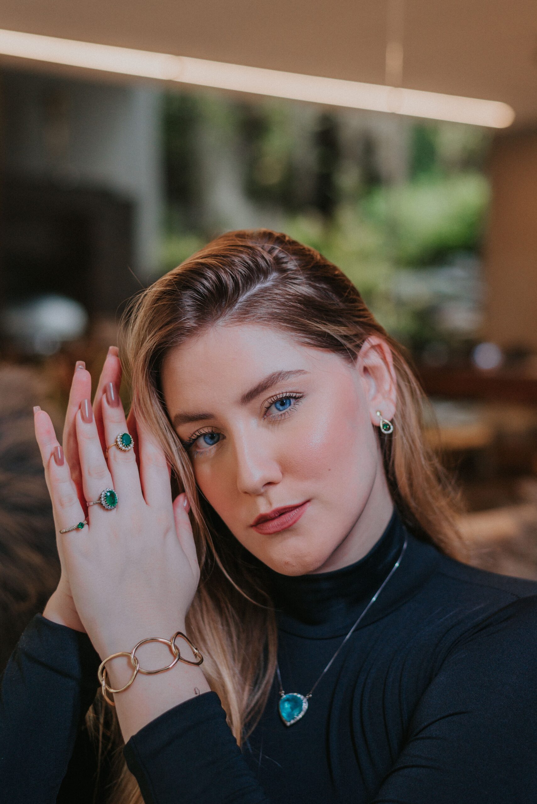 Add some sparkle to your life with our stunning ring collection! Our beautiful model showcases our latest rings, designed to add a touch of elegance to any outfit. From delicate and dainty to bold and eye-catching, our rings come in a variety of styles to suit your personal taste. Made with high-quality materials and exquisite craftsmanship, our rings are the perfect accessory to elevate your fashion game. Browse our collection now and find the perfect ring to adorn your fingers