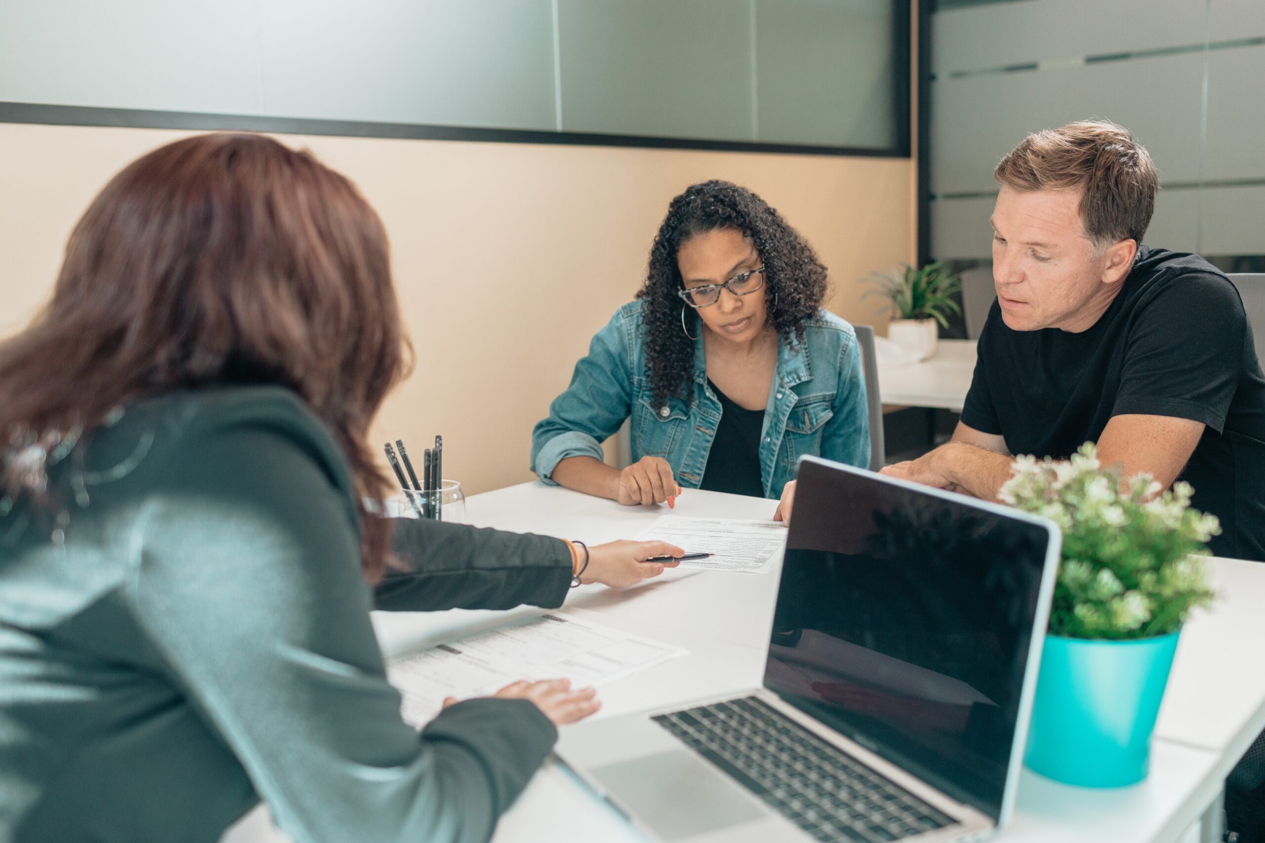 A group of advisors and clients in a discussion session