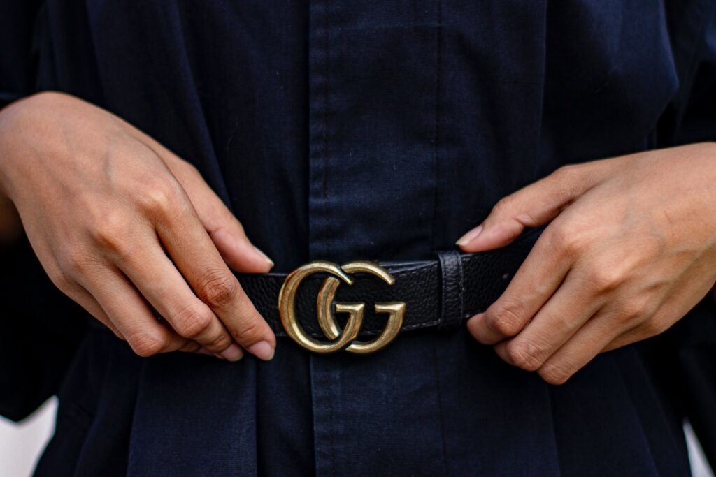 A gold coated leather Gucci belt for women
